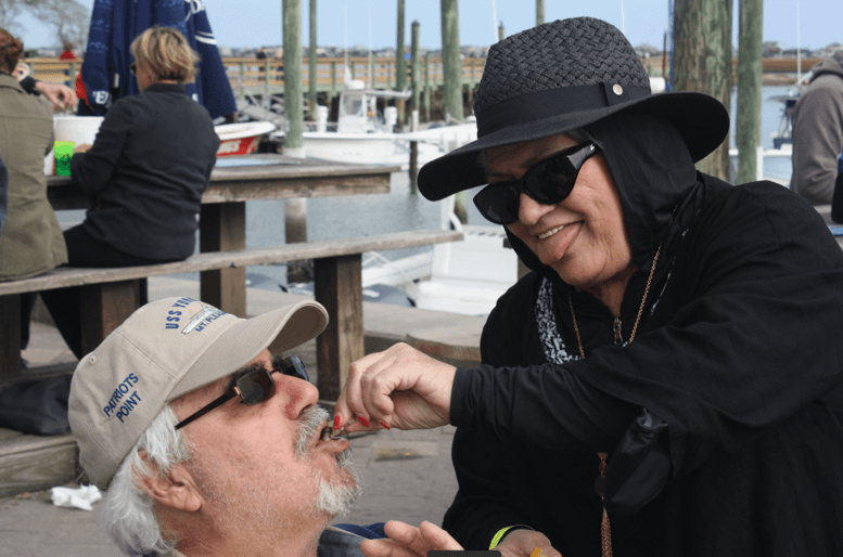 Woman feeding man reduced-Hammock-Coast-South-Carolina