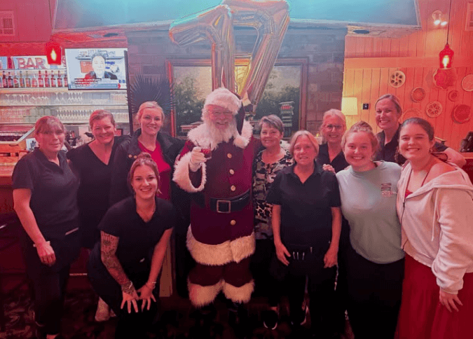 Santa and staff with drink cropped 1-Hammock-Coast-South-Carolina