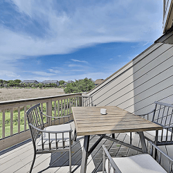 Save on this 3-bedroom condo overlooking the marsh and creek!